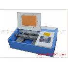 供應(yīng)高密激光印章機(jī) 2525小型工藝品激光雕刻機(jī) 掛件雕刻機(jī)